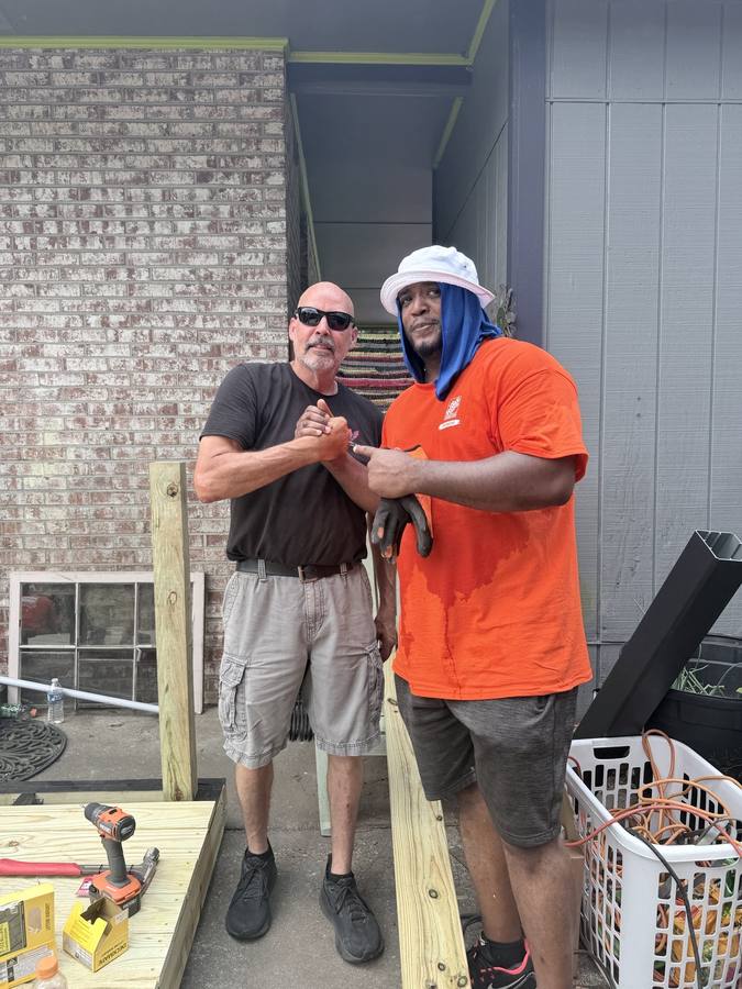Warriors Haven and Team Depot volunteers shaking hands
